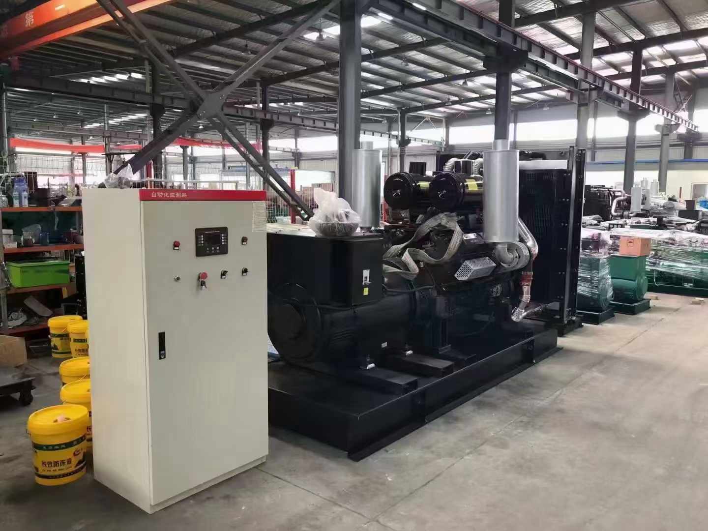 铁门关柴油发电机组负载测试时，若出现异常运行状态应如何处理？